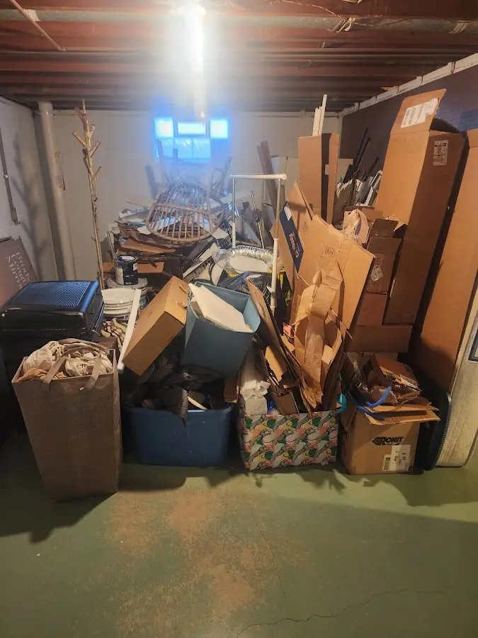 Roll-off dumpster container at job site for Yard Waste Dumpster Rental in Highland Park